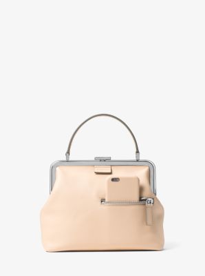 Angela Small French Calf Leather Top-Handle Bag. $1,390.00. Quickview. Share icon. Email \u0026middot; Floral-Embroidered Cashmere Sweater by Michael Kors