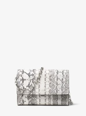 Yasmeen Small Snakeskin Clutch. $790.00. Quickview. Share icon. Email \u0026middot; Yasmeen Small Metallic Leather Clutch by Michael Kors