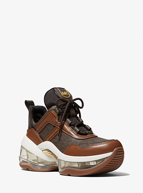 MK Olympia Extreme Logo and Leather Trainer - Luggage Brown - Michael Kors