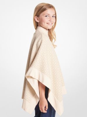 Cape en tricot métallisé à logo