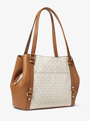 GU_DE（グッド）正規品/送料関税込み Carrie Bag - Brown Carrie Large Logo Shoulder Bag | Michael Kors [US]