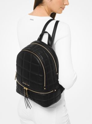 Michael Kors Rhea mini messenger Monogram embossed leather backpack New $358