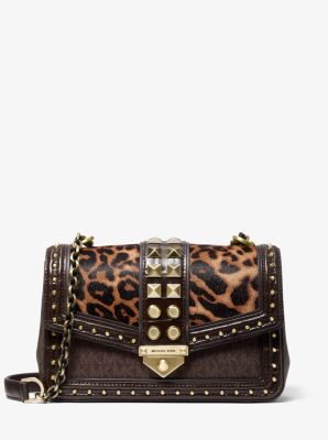 soho large studded quilted straw shoulder bag
