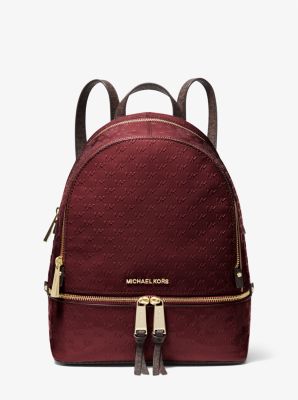 Sac &agrave; dos Rhea de taille moyenne en cuir verni gaufr&eacute; &agrave; logo