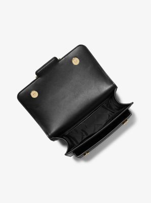 Grand sac &agrave; &eacute;paule Heather en poils de veau &agrave; imprim&eacute; l&eacute;opard clout&eacute; et &agrave; logo