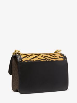 Grand sac &agrave; &eacute;paule Heather en poils de veau &agrave; imprim&eacute; l&eacute;opard clout&eacute; et &agrave; logo