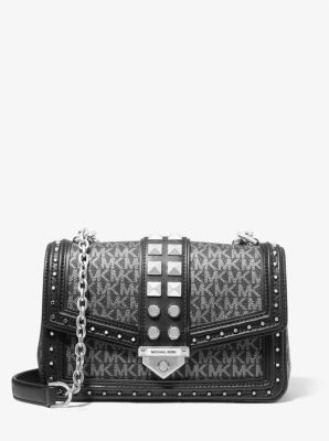 soho large studded quilted straw shoulder bag
