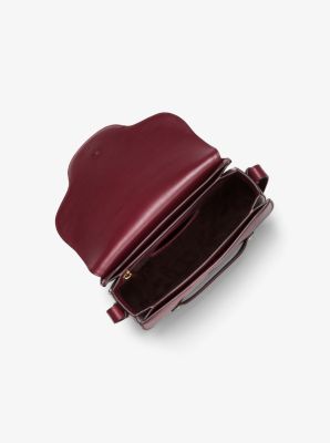 Cary small grommeted outlet leather saddle bag