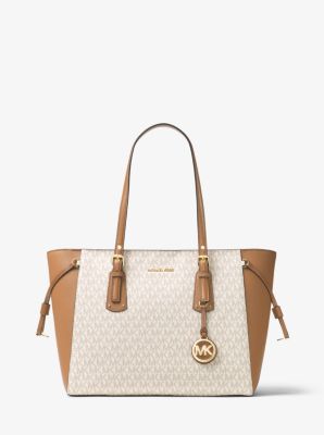 Actualizar 47+ imagen michael kors purse brown and white