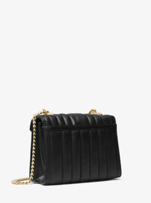 black quilted mk purse