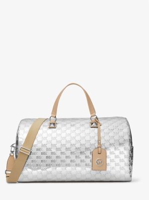 Why are Louis Vuitton bags more expensive than Michael Kors? - Quora