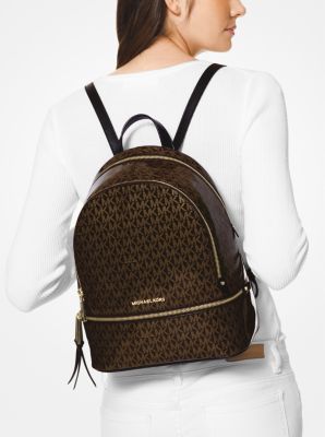 Michael kors on sale glossy backpack