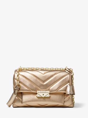 michael kors metallic rose gold backpack