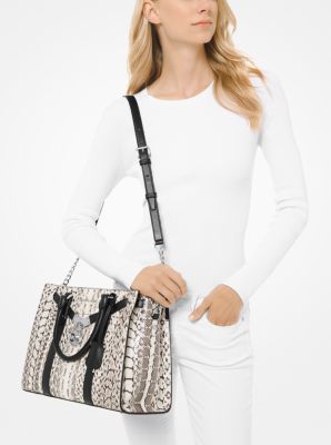 Michael Kors Medium Selma White Messenger lock and key purpose