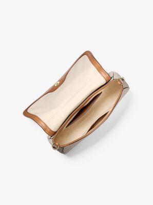 Wandelbare Schultertasche Nolita Medium mit Signature-Logomuster