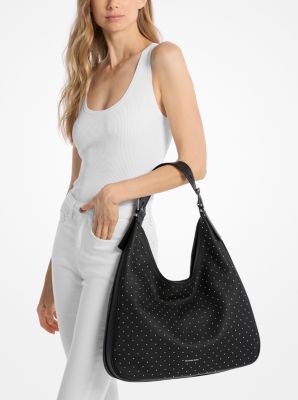 Borsa hobo Nolita grande in pelle martellata con borchie in NERO | Michael Kors