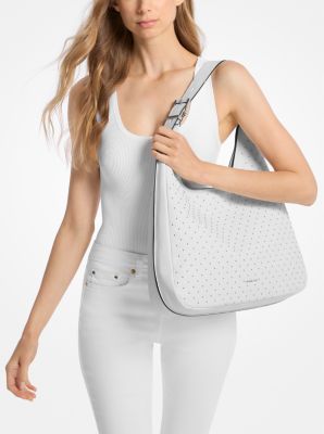 Borsa hobo Nolita grande in pelle martellata con borchie in BIANCO OTTICO | Michael Kors