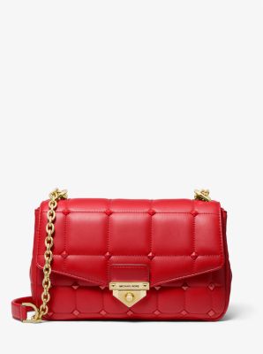 soho large studded quilted straw shoulder bag