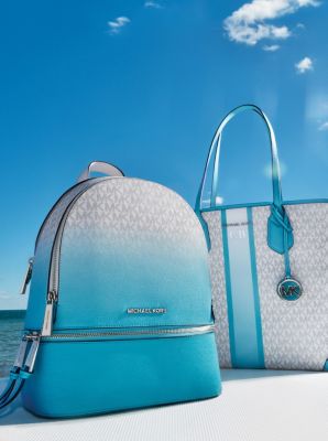 Michael kors blue and best sale white backpack