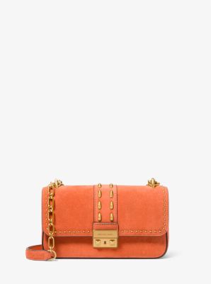 MK Schultertasche Tribeca Small Aus Wildleder Mit Nieten - Orange