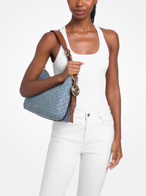 Nolita Medium Logo Embossed Denim Convertible Shoulder Bag