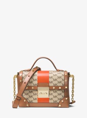 Michael kors cori trunk on sale bag