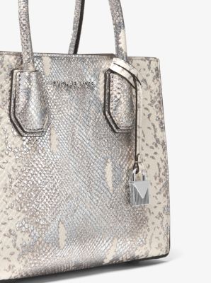 You should definitely buy this metallic Michael Kors crossbody bag