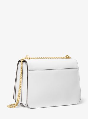 Michael Kors★Mott Pebbled Leather☆ドーム型 クロスボディー Mott Pebbled Leather Dome Crossbody Bag | Michael Kors [US]