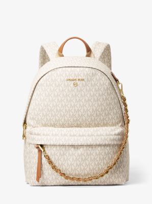 Arriba 42+ imagen michael kors backpack white and gold