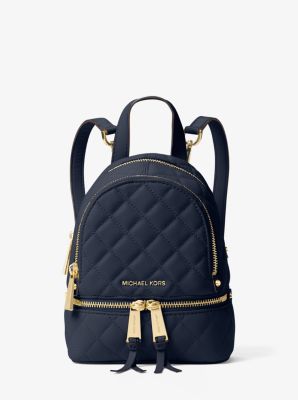 Michael Kors Rhea mini messenger Monogram embossed leather backpack New $358