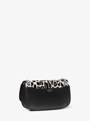 Tasche Christie Mini mit Umschlag aus Leder und Kalbshaar mit Leopardenmuster image number 1