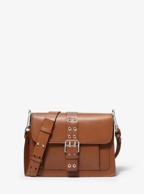 price of michael kors sling bag