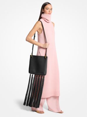 Bandolera mediana Tate de piel con borlas