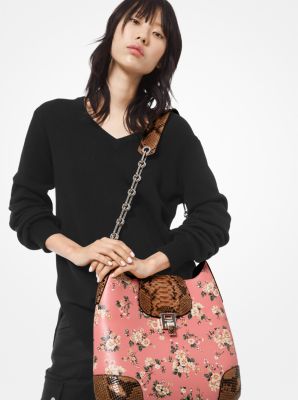 Michael kors Black Leather handbag with an extra floral shoulder strap,RRP  $498