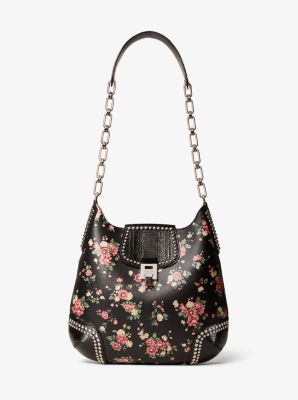 Michael kors Black Leather handbag with an extra floral shoulder strap,RRP  $498