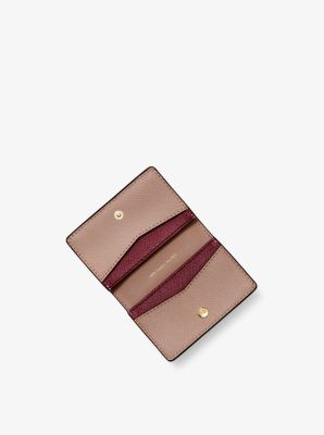 Petit portefeuille en cuir &agrave; grain crois&eacute; &agrave; deux tons