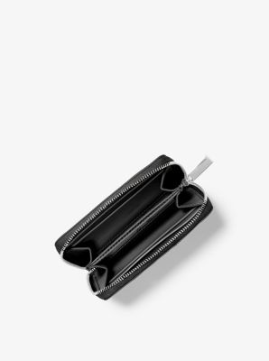 Petit portefeuille en cuir matelass&eacute;