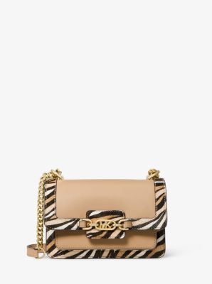 Borsa a tracolla Heather extra-small in pelle e pelle effetto cavallino tigrata