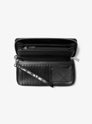 Portefeuille continental Jet Set Travel en cuir métallisé et gaufré à motif de crocodile image number 0