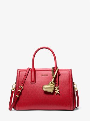 Bauschiger, herzförmiger Taschenanhänger aus Leder in Metallic-Optik