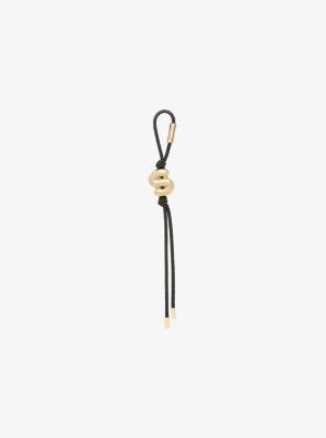 Initial Gold-Tone and Speckled Cord Bag Charm image number 0