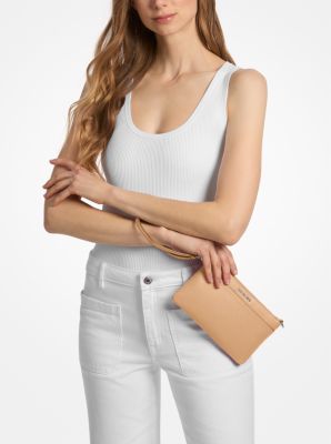 Pochette da polso convertibile Jet Set media in pelle martellata in ARACHIDE | Michael Kors