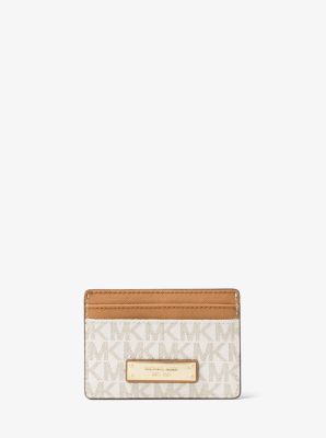 You should definitely buy this sleek Michael Kors wallet while