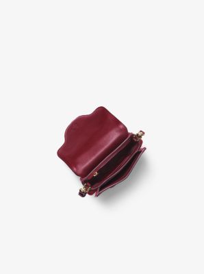 michael kors cary small leather saddle bag