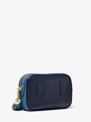 Jet set small store pebbled leather wristlet