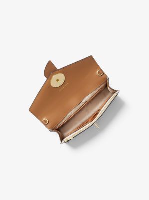 michael kors medium logo convertible crossbody bag bisque｜TikTok Search