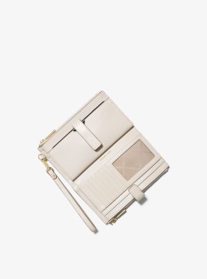 Adele Logo Debossed Leather Wristlet