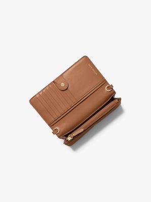 Logo Debossed Leather Convertible Crossbody Bag