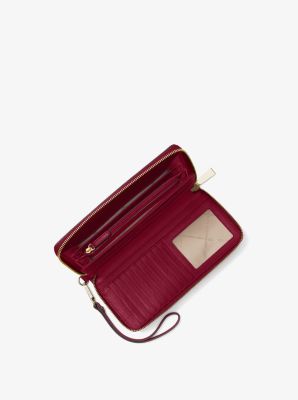 Leather Continental Wristlet in BERRY | Michael Kors