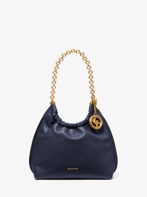 MK Pochette Indie Medium Aus Leder - Blau